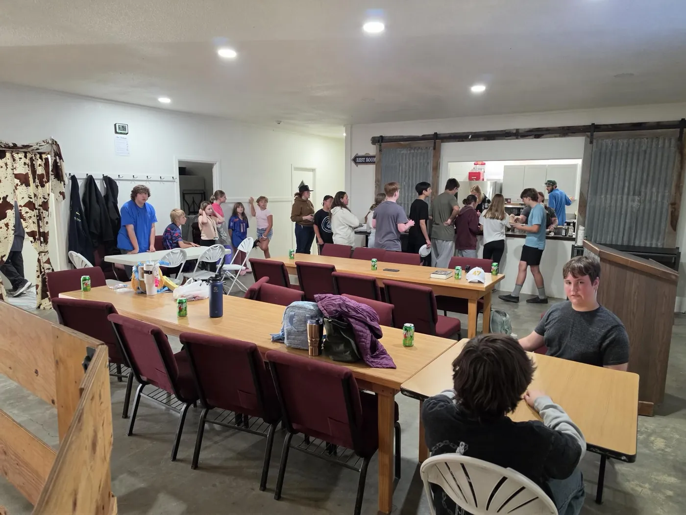 Students sharing a meal together at The Refuge youth night at Crosspoint Church of Caldwell